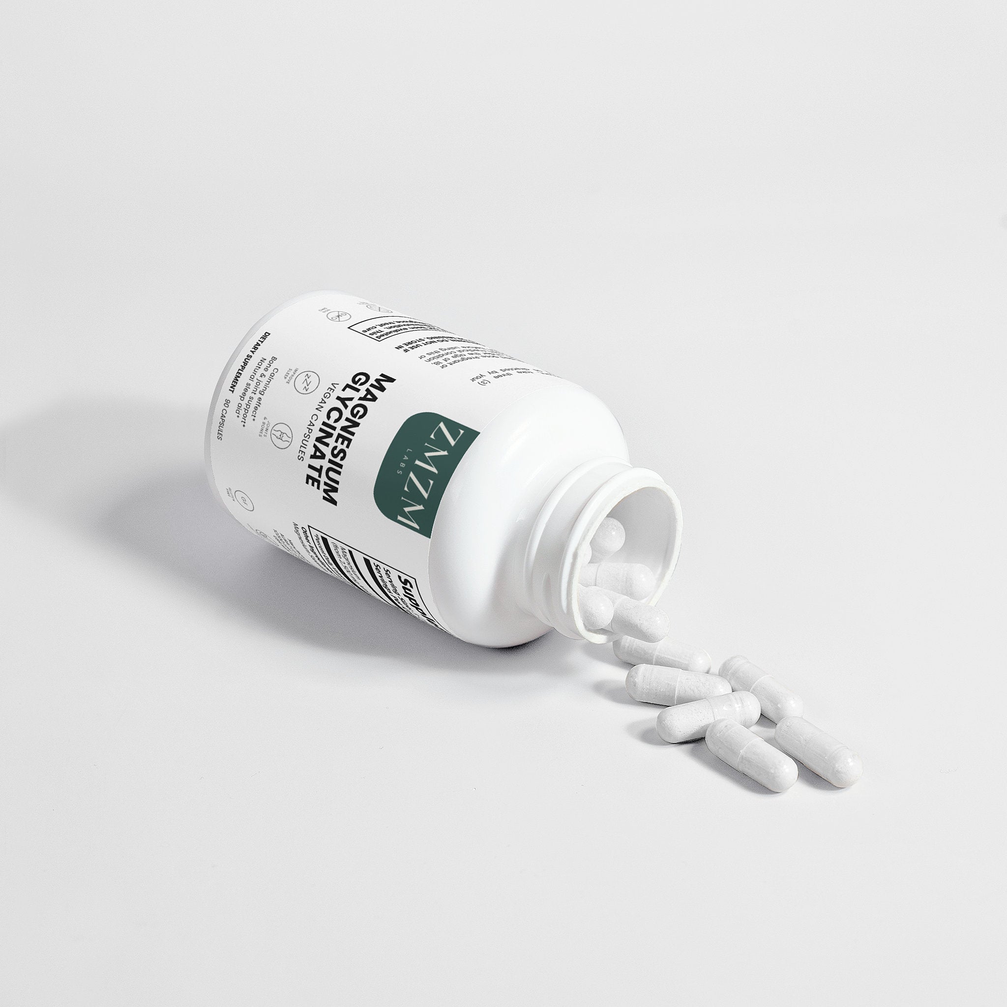 White bottle with a green label on a light gray background