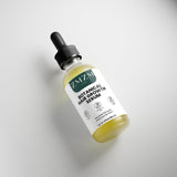 Bottle of ZNZM Labs Botanical Botanical Hair Growth Serum on a light gray background