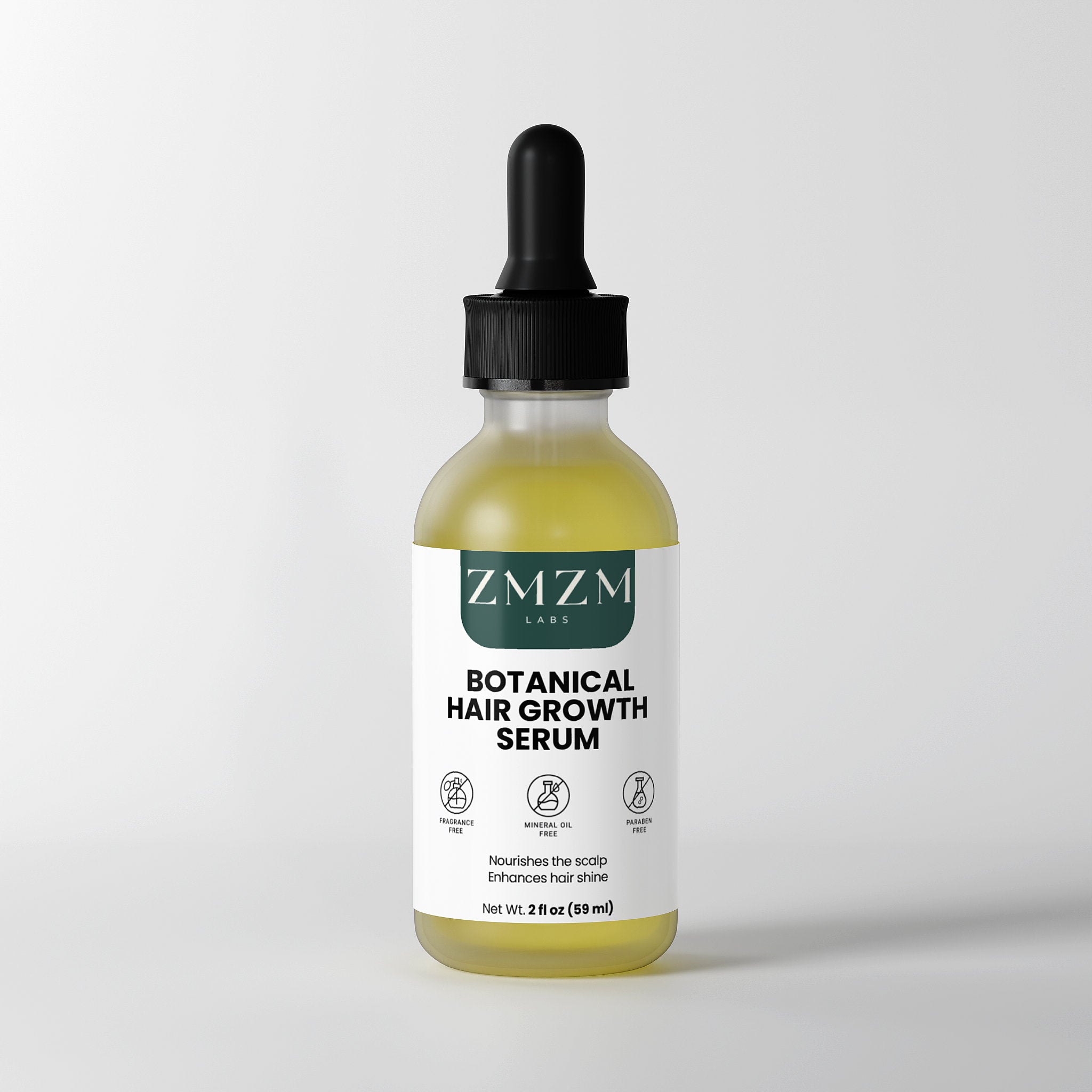 ZMZM Labs Botanical Hair Growth Serum bottle with dropper on a light gray background